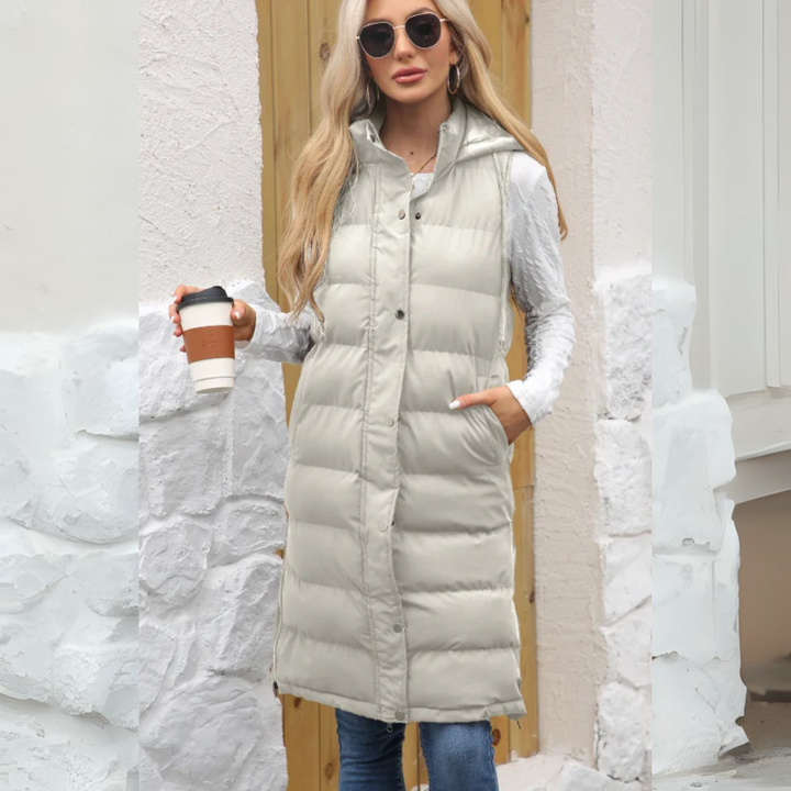 Lange Steppweste für kalte Tage - Warme Daunenweste mit Kapuze für Damen