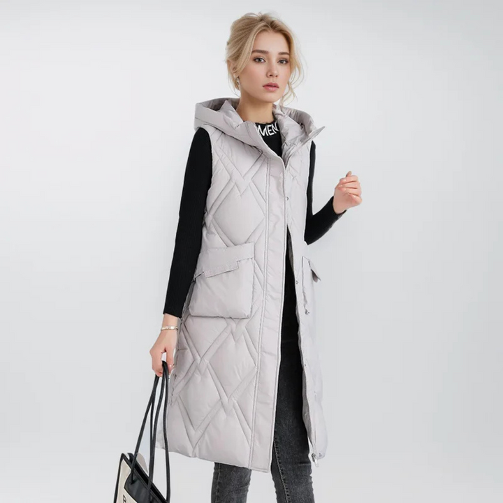 Lange Steppweste für kalte Tage - Puffer Daunenweste mit Kapuze für Damen
