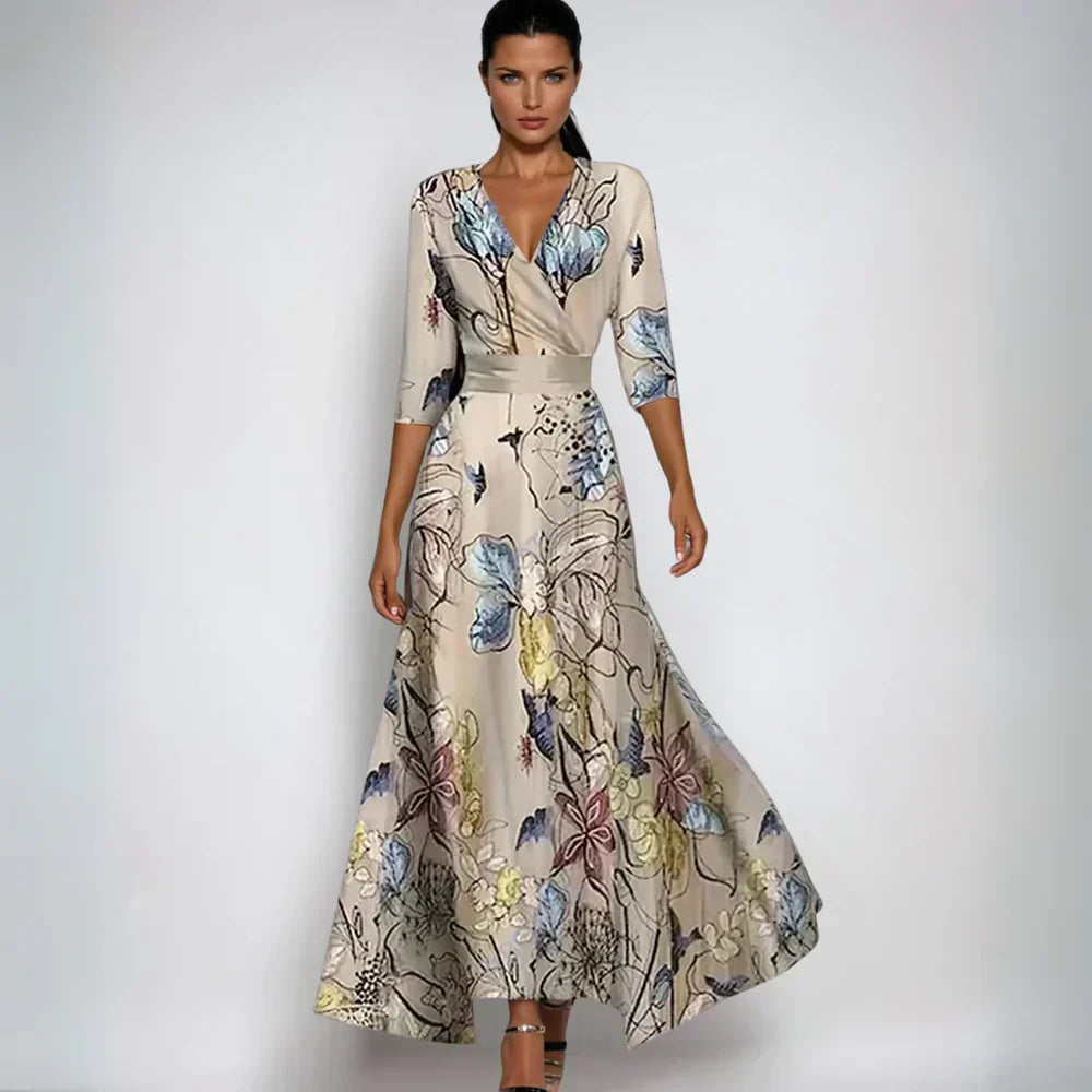 Elegantes Damenkleid mit floralem Muster, V-Ausschnitt und Dreiviertelärmeln. Perfekt für besondere Anlässe und modische Auftritte.