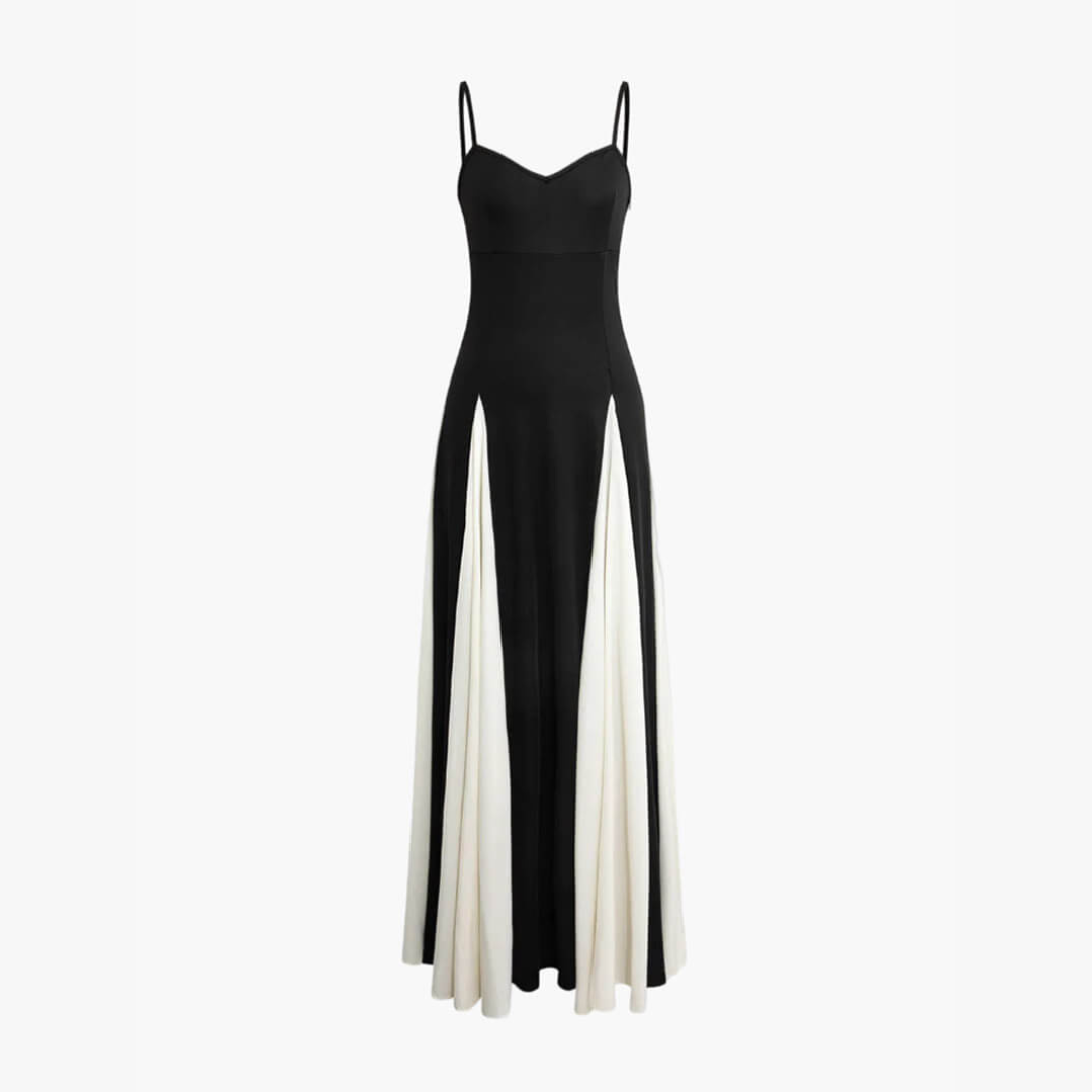 Schwarzes Abendkleid mit weißen Einsätzen, Spaghettiträgern und ausgestelltem Rock. Elegantes Design, ideal für formelle Anlässe und Events.