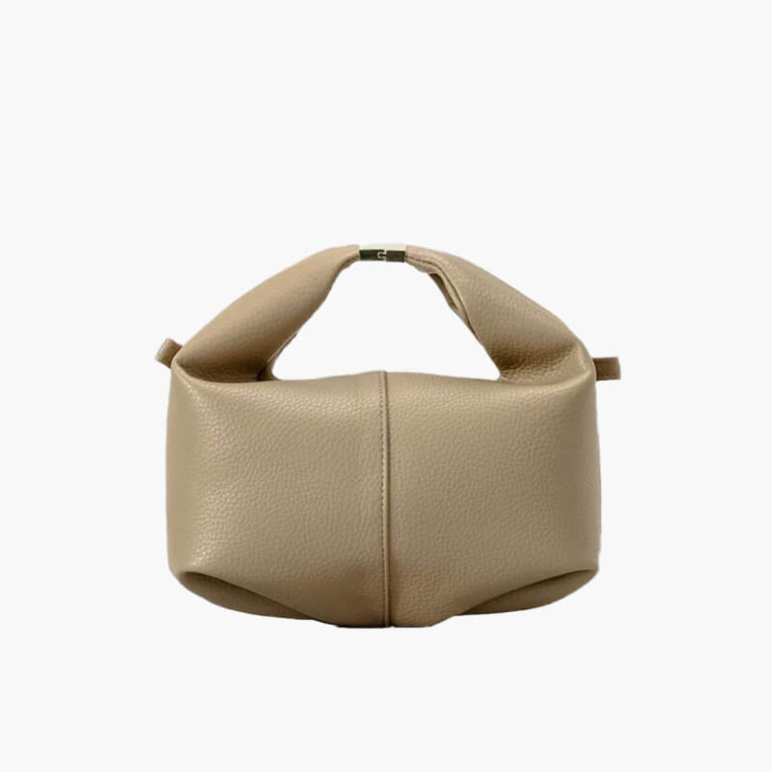 Beigefarbene Lederhandtasche mit modernem Design, weicher Struktur und praktischem Griff. Elegante Damenmode, stilvolles Accessoire.