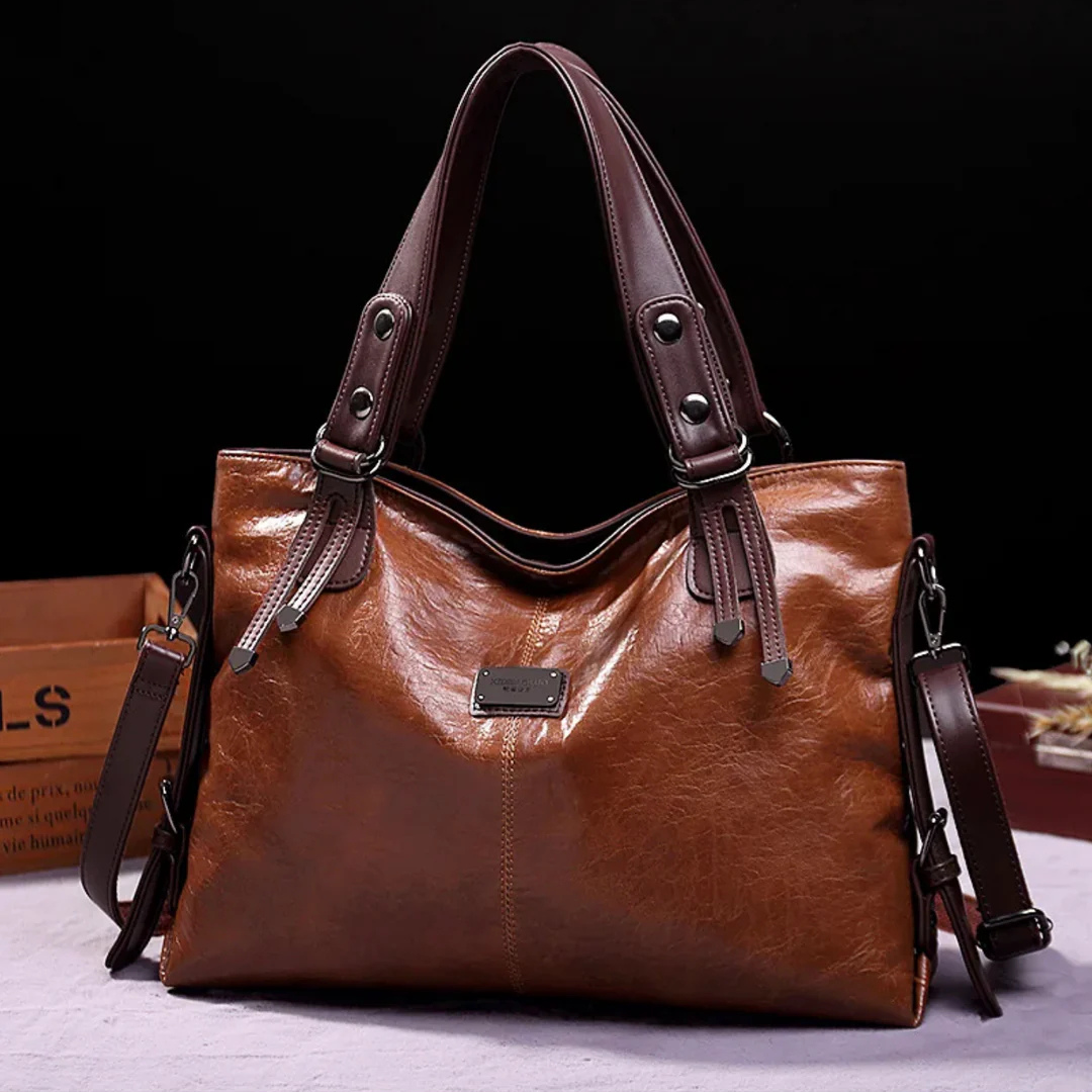 Braune Ledertasche mit doppelten Griffen und abnehmbarem Schultergurt, elegante Damenhandtasche, ideal für Alltag und Büro, hochwertige Verarbeitung.
