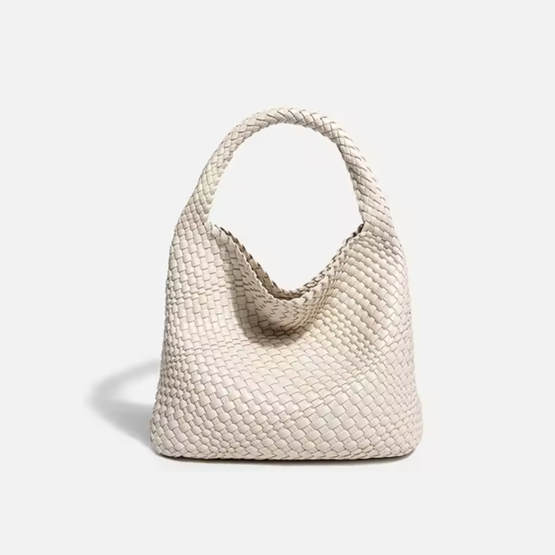 Beige geflochtene Handtasche aus Leder mit Henkeln, modisches Accessoire, elegantes Design, Damenmode, stilvolle Tasche für Alltag und Events.
