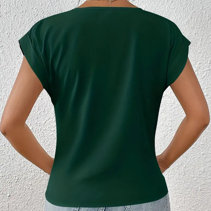 Dunkelgrünes Damen-T-Shirt aus Baumwolle, Rückansicht. Kurzarm, lässiger Stil, ideal für Sommermode. Perfekt für Freizeit und Alltag.