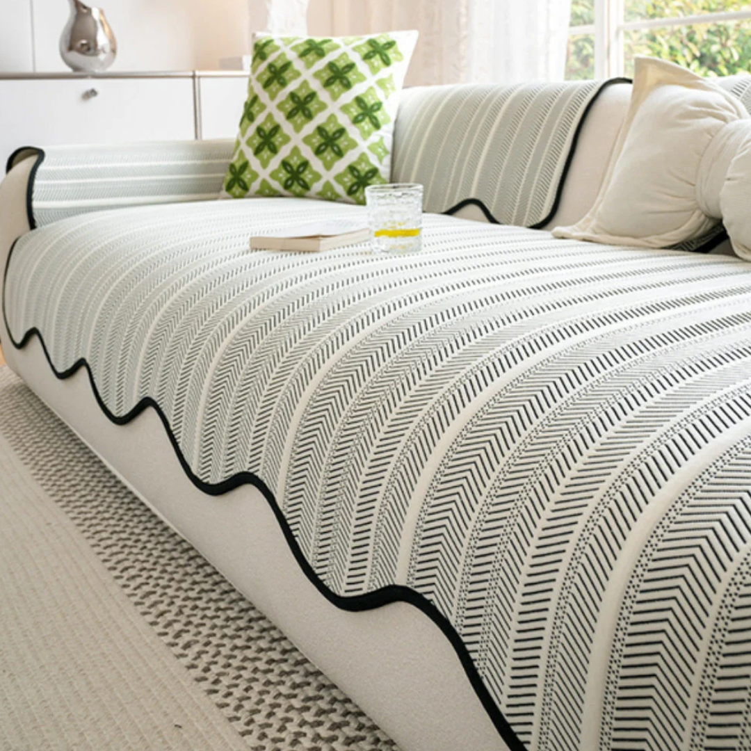 Fischgräten Sofaüberwurf | Atmungsaktive Decke mit Wellenkante
