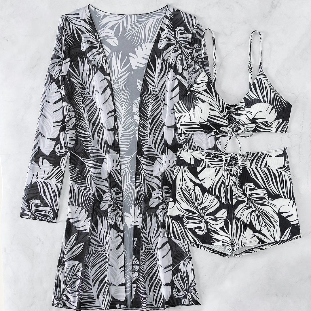 Schwarz-weißes tropisches Bikini-Set mit passendem Kimono, Blattmuster, Strandmode, Damenbademode, Sommeroutfit, stilvoll und modern.
