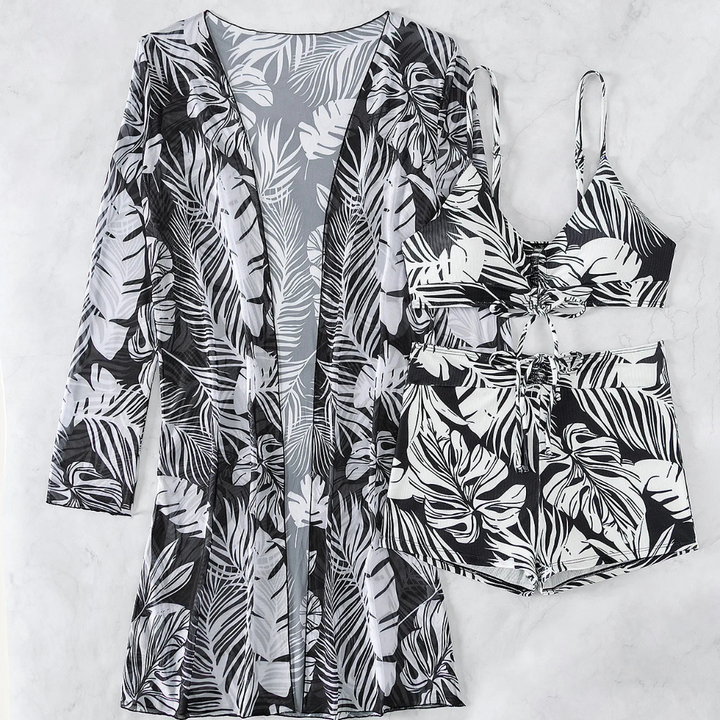 Schwarz-weißes tropisches Bikini-Set mit passendem Kimono, Blattmuster, Strandmode, Damenbademode, Sommeroutfit, stilvoll und modern.