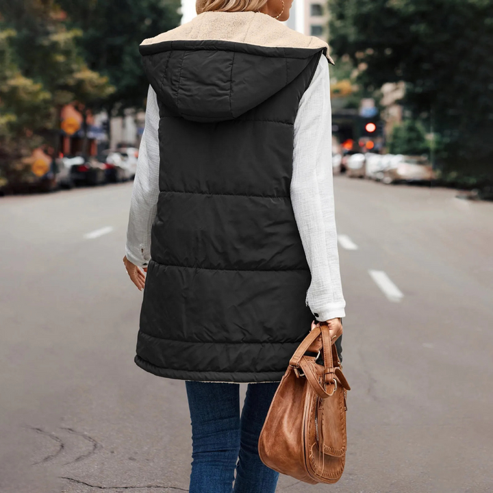 Lange Steppweste für kalte Tage - Stilvolle Daunenweste mit Fleece Futter und Kapuze für Damen