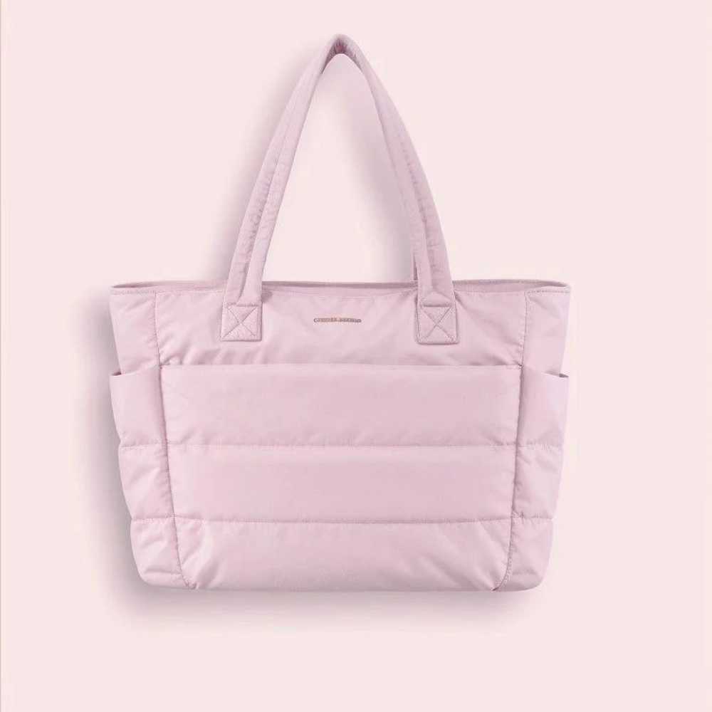Rosa gesteppte Handtasche mit Tragegriffen, modisches Accessoire, Damenmode, stilvolle Tasche, elegantes Design, vielseitig einsetzbar.