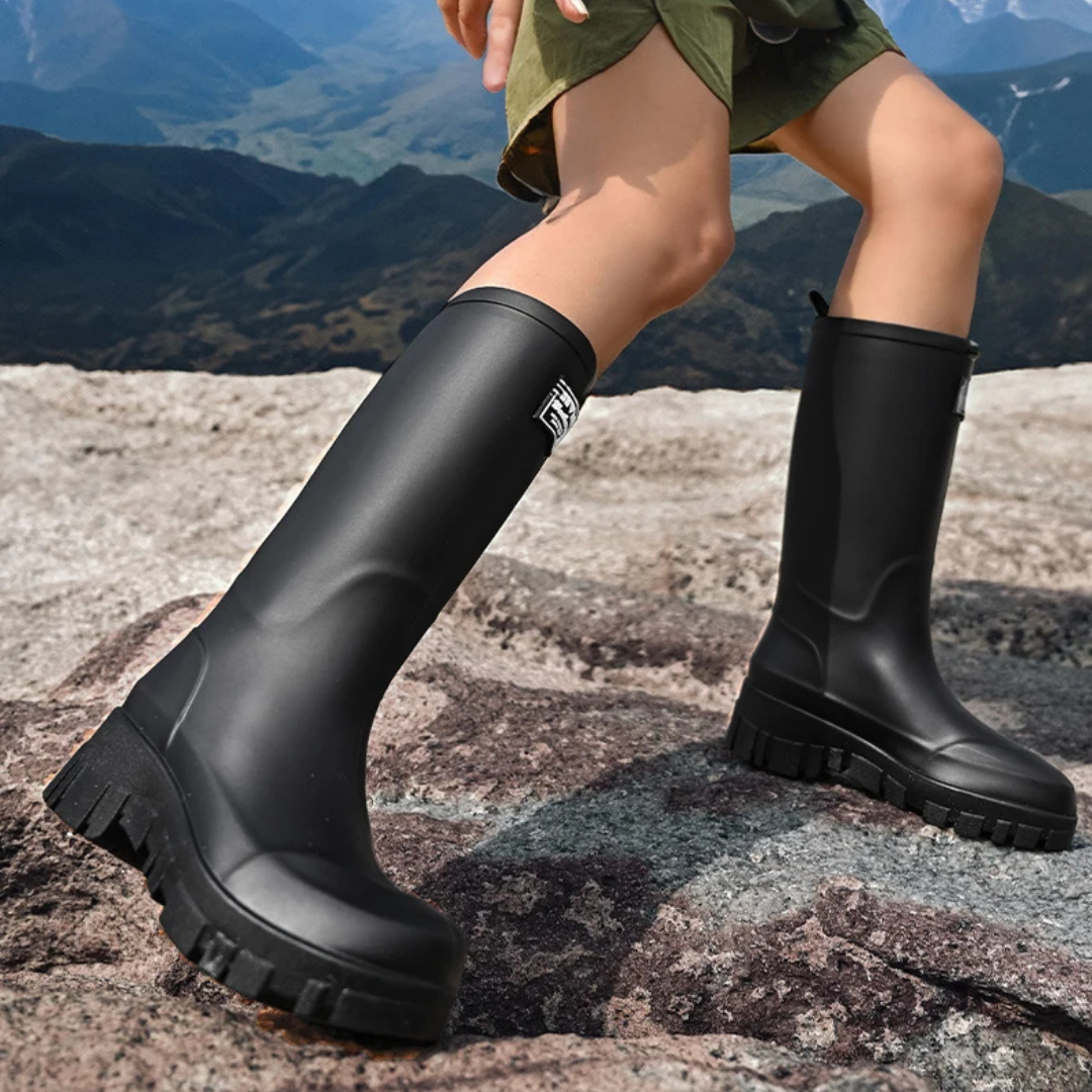 Regenstiefel für den Herbst - Schwarze Chelsea Gummistiefel mit Blockabsatz und Profilsohle für Damen