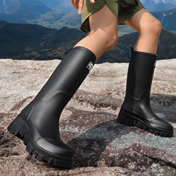 Regenstiefel für den Herbst - Schwarze Chelsea Gummistiefel mit Blockabsatz und Profilsohle für Damen