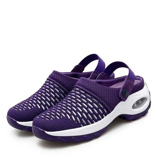 Lila Damen-Sneaker mit Netzdesign, atmungsaktiv und leicht, ideal für Sommer und Freizeit. Bequeme Schuhe mit weißer Sohle und Fersenriemen.
