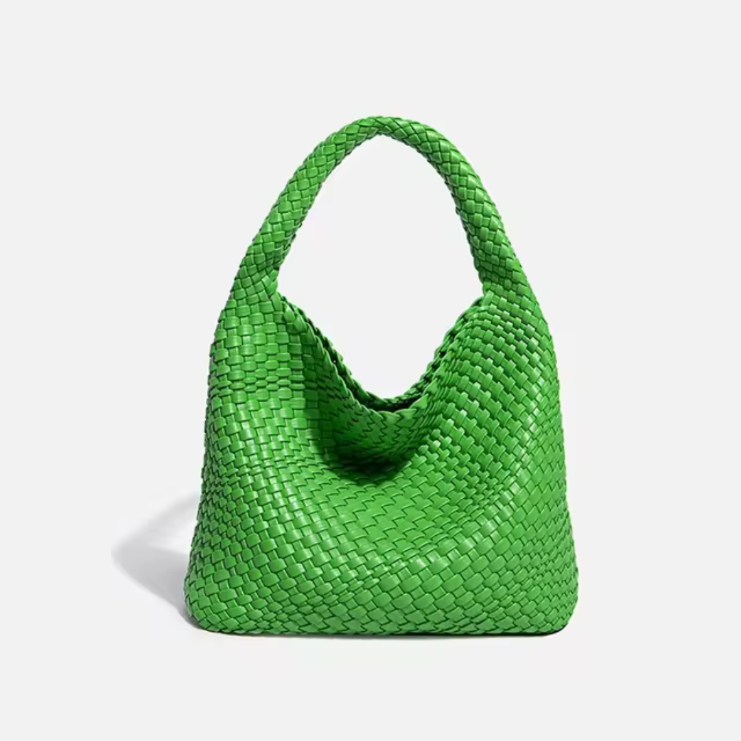 Grüne geflochtene Handtasche aus Leder, modisches Accessoire, elegantes Design, Damenmode, trendige Tasche, stilvoller Look.