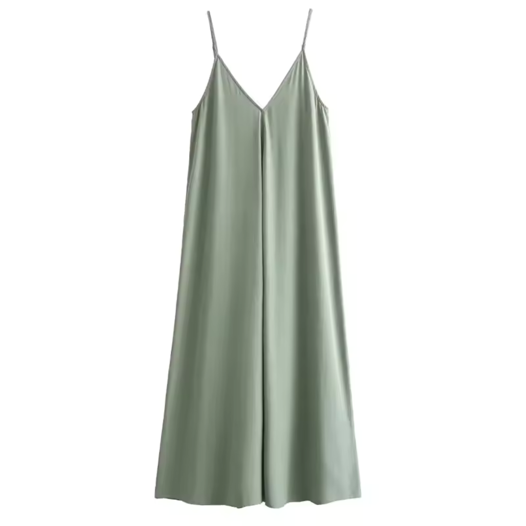 Grünes Sommerkleid mit Spaghettiträgern, V-Ausschnitt und fließendem Schnitt. Perfekt für Damenmode, Freizeitkleidung und Sommeroutfits.