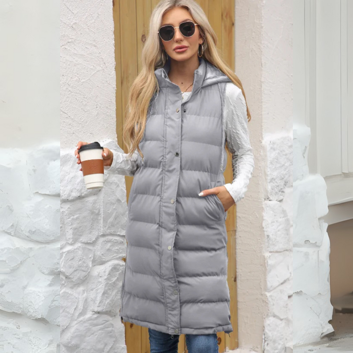 Lange Steppweste für kalte Tage - Warme Daunenweste mit Kapuze für Damen