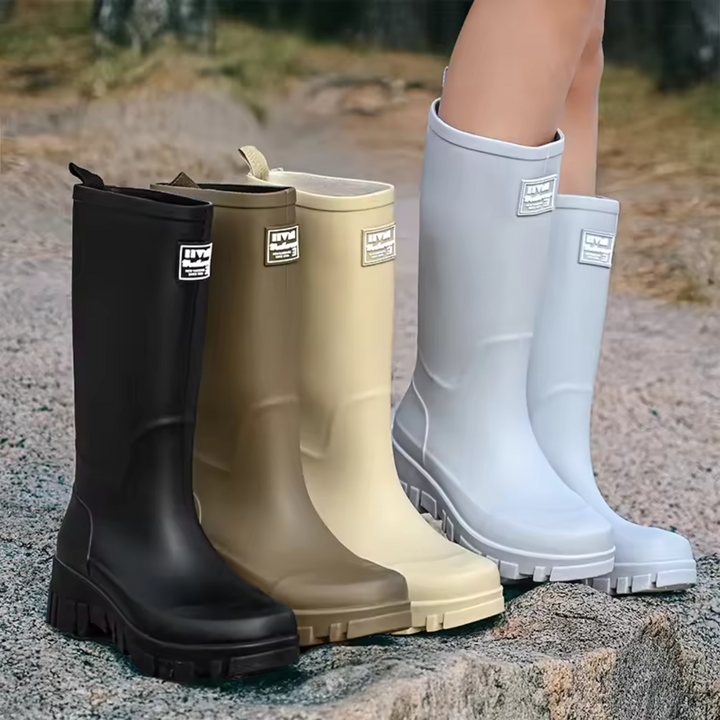 Regenstiefel für den Herbst - Schwarze Chelsea Gummistiefel mit Blockabsatz und Profilsohle für Damen